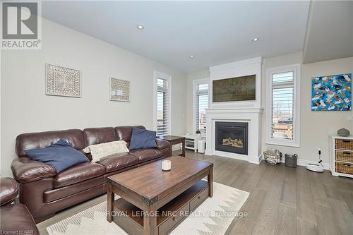 72 Mackenzie King Ave, St. Catharines, ON - Indoor Photo Showing Living Room With Fireplace