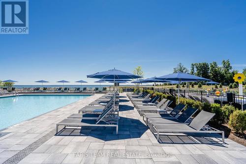 #305 -241 Sea Ray Ave, Innisfil, ON - Outdoor With In Ground Pool With View