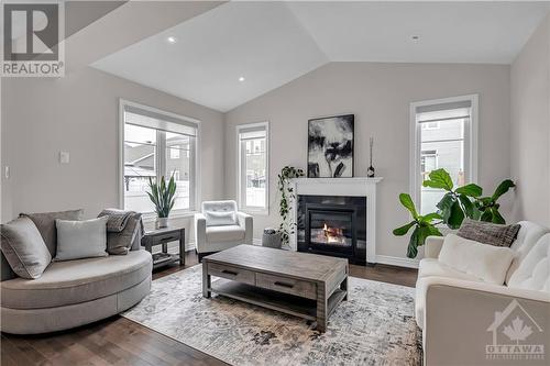 197 Equitation Circle, Ottawa, ON - Indoor Photo Showing Living Room With Fireplace