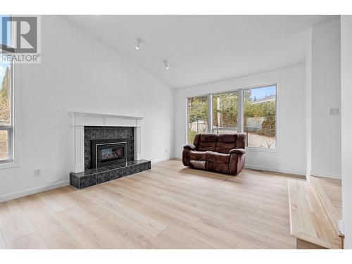 1837 Olympus Way, West Kelowna, BC - Indoor Photo Showing Living Room With Fireplace
