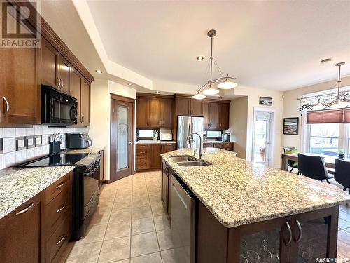 209 Riverbend Place, Battleford, SK - Indoor Photo Showing Kitchen With Double Sink With Upgraded Kitchen