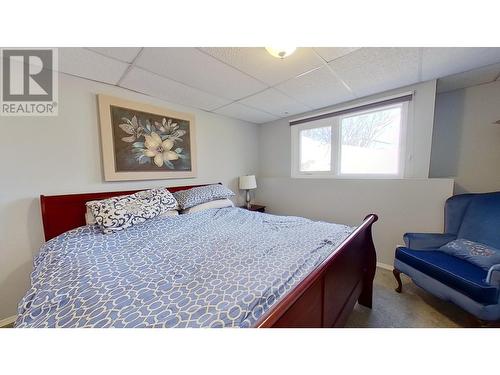 13514 Robin Road, Charlie Lake, BC - Indoor Photo Showing Bedroom