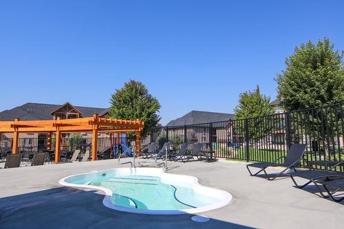 713B - 700 Bighorn Boulevard, Radium Hot Springs, BC - Outdoor With In Ground Pool With Deck Patio Veranda