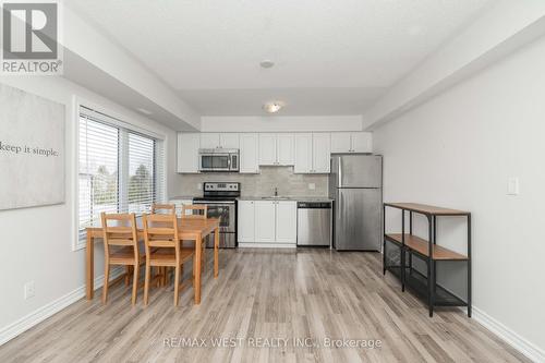 #309 -2 Anchorage Cres, Collingwood, ON - Indoor Photo Showing Kitchen With Stainless Steel Kitchen