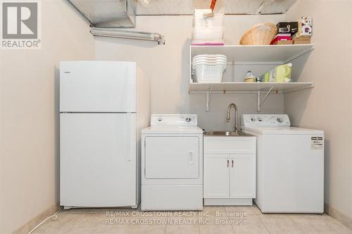 1 Neretva St, Springwater, ON - Indoor Photo Showing Laundry Room