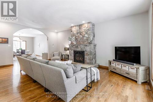 1 Neretva St, Springwater, ON - Indoor Photo Showing Living Room With Fireplace
