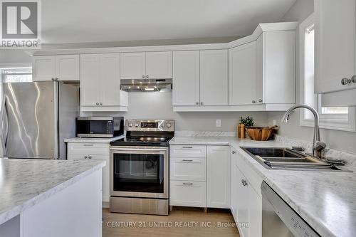 909 Fairbairn Street, Smith-Ennismore-Lakefield, ON - Indoor Photo Showing Kitchen With Double Sink With Upgraded Kitchen