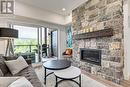 205 - 16 Beckwith Lane, Blue Mountains, ON  - Indoor Photo Showing Living Room With Fireplace 