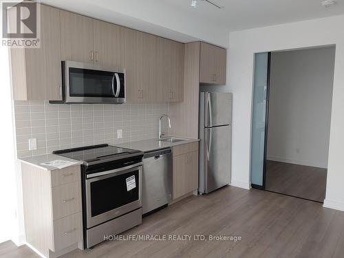 #614 -2799 Kingston Rd, Toronto, ON - Indoor Photo Showing Kitchen With Stainless Steel Kitchen