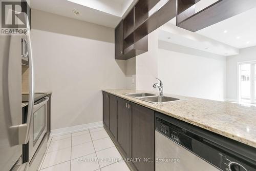 #36 -310 Village Green Sq, Toronto, ON - Indoor Photo Showing Kitchen With Double Sink