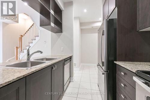 #36 -310 Village Green Sq, Toronto, ON - Indoor Photo Showing Kitchen With Double Sink With Upgraded Kitchen