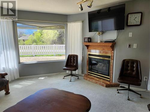 6446 Meadows Drive Unit# 8, Oliver, BC - Indoor With Fireplace
