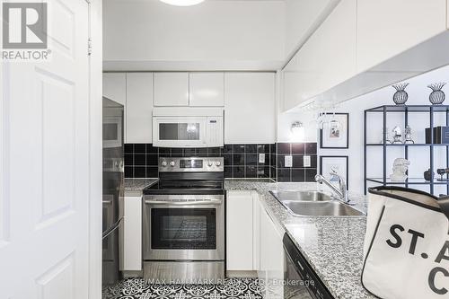 #1222 -230 Queens Quay W, Toronto, ON - Indoor Photo Showing Kitchen With Double Sink
