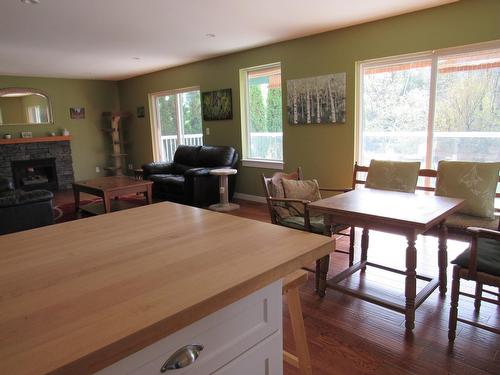 925 Columbia Road, Castlegar, BC - Indoor Photo Showing Dining Room With Fireplace
