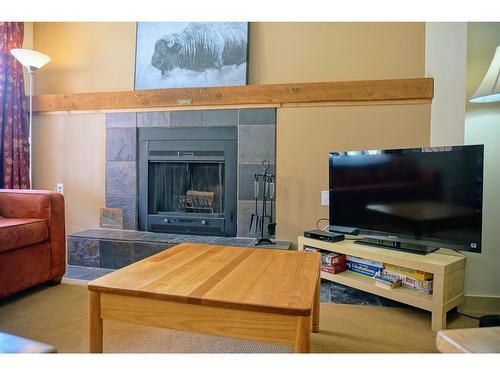 529 - 2030 Panorama Drive, Panorama, BC - Indoor Photo Showing Living Room With Fireplace