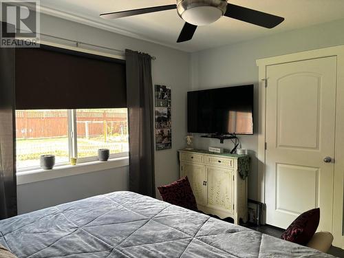 1835 First  Street, Fruitvale, BC - Indoor Photo Showing Bedroom