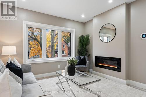 27 Chestnut St, Kitchener, ON - Indoor Photo Showing Living Room With Fireplace