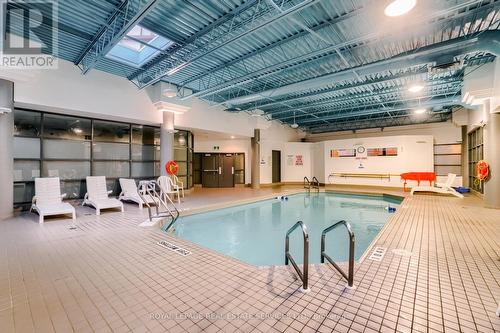 #201 -4205 Shipp Dr, Mississauga, ON - Indoor Photo Showing Other Room With In Ground Pool