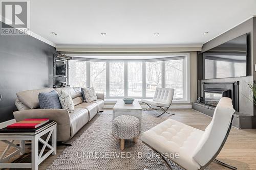27 Sagebrush Lane, Toronto, ON - Indoor Photo Showing Living Room With Fireplace