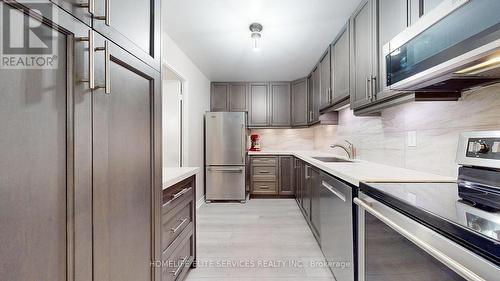 #612 -120 Dundalk Dr, Toronto, ON - Indoor Photo Showing Kitchen With Upgraded Kitchen