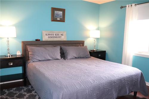 Primary bedroom with hardwood floors - 119 Jarrett Place, Dunnville, ON - Indoor Photo Showing Bedroom