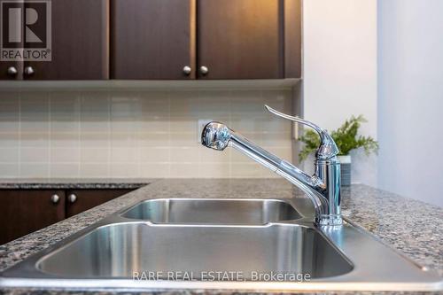 #143 -525 Wilson Ave, Toronto, ON - Indoor Photo Showing Kitchen With Double Sink