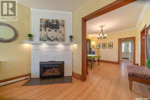 115 Connaught Crescent, Regina, SK - Indoor Photo Showing Living Room With Fireplace