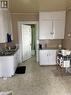 143 Roslyn Avenue, Canora, SK  - Indoor Photo Showing Kitchen With Double Sink 