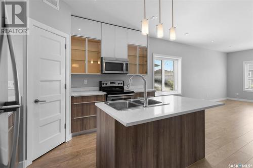 1018 Evergreen Boulevard, Saskatoon, SK - Indoor Photo Showing Kitchen With Double Sink With Upgraded Kitchen