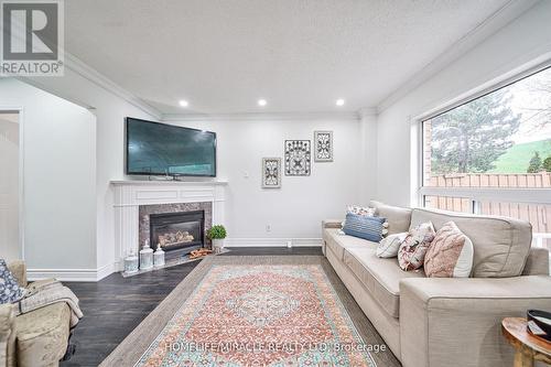 5893 Sidmouth St, Mississauga, ON - Indoor Photo Showing Living Room With Fireplace