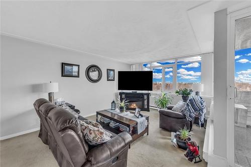 30 Harrisford Street|Unit #701, Hamilton, ON - Indoor Photo Showing Living Room With Fireplace