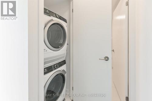 1115 - 219 Dundas Street E, Toronto, ON - Indoor Photo Showing Laundry Room