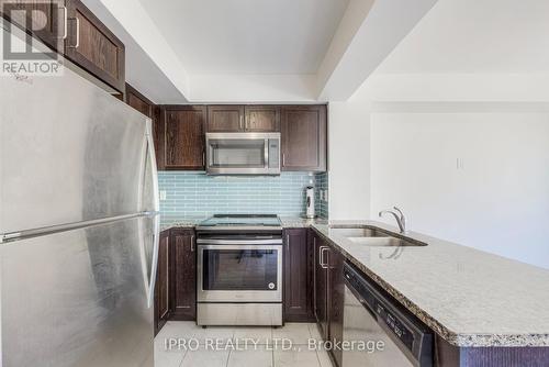 #231 -7 Applewood Lane, Toronto, ON - Indoor Photo Showing Kitchen With Double Sink