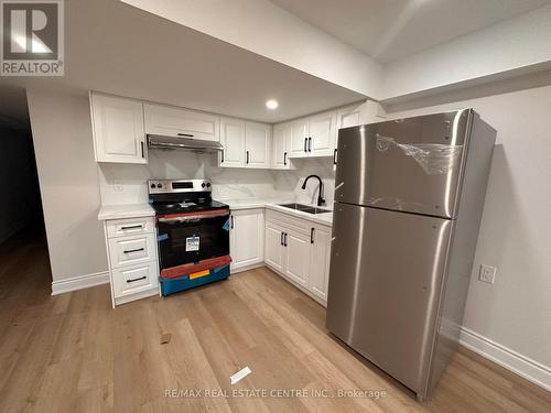 #Bsmt 2 -19 Pointer St, Cambridge, ON - Indoor Photo Showing Kitchen With Double Sink