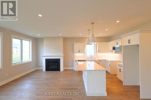 #Lot 24 -413 Breakwater Blvd, Central Elgin, ON - Indoor With Fireplace