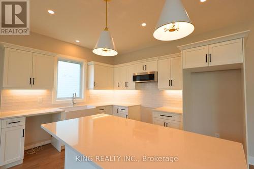 Lot 24 - 413 Breakwater Boulevard, Central Elgin, ON - Indoor Photo Showing Kitchen