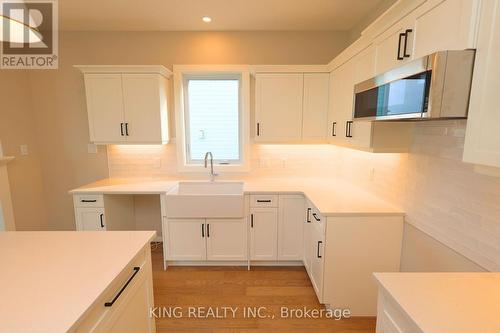 Lot 24 - 413 Breakwater Boulevard, Central Elgin, ON - Indoor Photo Showing Kitchen