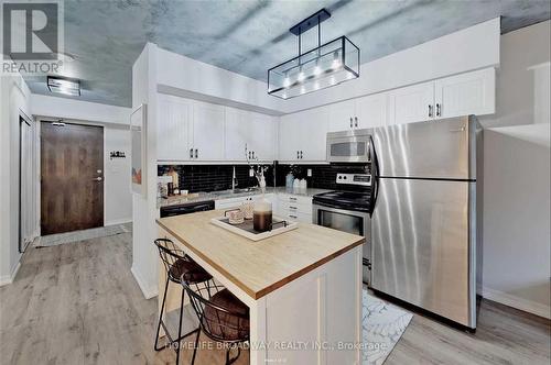 ##607 -22 Wellesley St E, Toronto, ON - Indoor Photo Showing Kitchen With Stainless Steel Kitchen