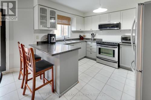63 Hawkins Dr, Barrie, ON - Indoor Photo Showing Kitchen With Double Sink
