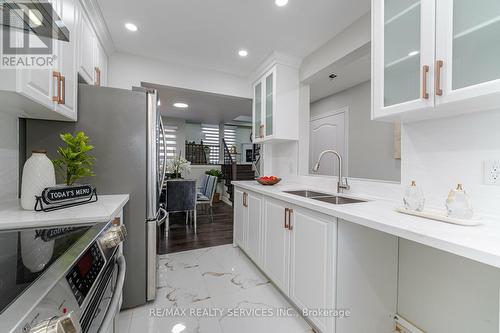 32 Ashurst Cres, Brampton, ON - Indoor Photo Showing Kitchen With Double Sink