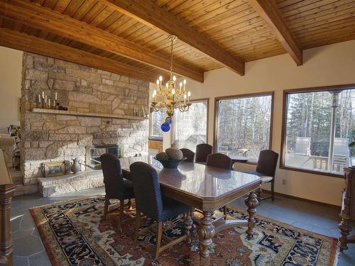 1660 25Th Side Road, Thunder Bay, ON - Indoor Photo Showing Dining Room With Fireplace