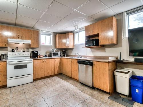 Intergenerational - 395  - 399 Rue Marthe, Saint-Philippe, QC - Indoor Photo Showing Kitchen With Double Sink
