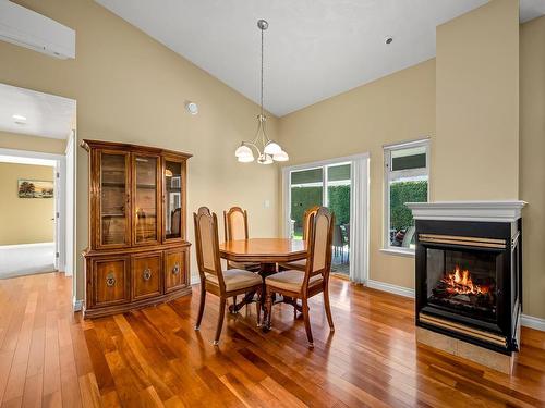 127-44 Anderton Ave, Courtenay, BC - Indoor Photo Showing Dining Room With Fireplace