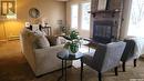 837 Northumberland Avenue, Saskatoon, SK  - Indoor Photo Showing Living Room With Fireplace 