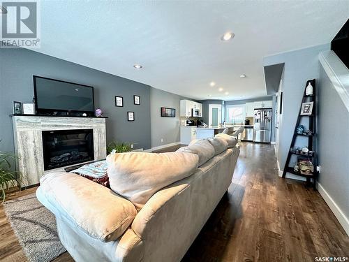 1309 D Avenue N, Saskatoon, SK - Indoor Photo Showing Living Room With Fireplace