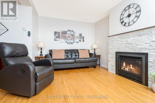 25 Archibald St, Brampton, ON - Indoor Photo Showing Living Room With Fireplace