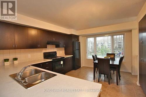 #63 -3050 Erin Centre Blvd, Mississauga, ON - Indoor Photo Showing Kitchen With Double Sink