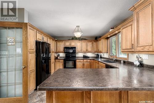 1629 Marshal Crescent, Moose Jaw, SK - Indoor Photo Showing Kitchen With Double Sink
