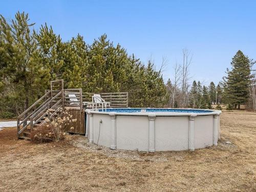 Exterior - 26 Ch. Des Renards-Blancs, L'Ange-Gardien, QC - Outdoor With Above Ground Pool