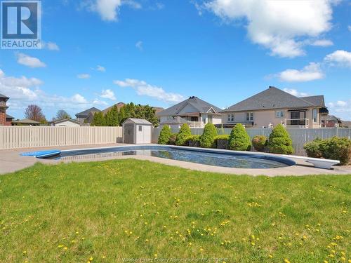 144 Meconi Court, Lakeshore, ON - Outdoor With In Ground Pool